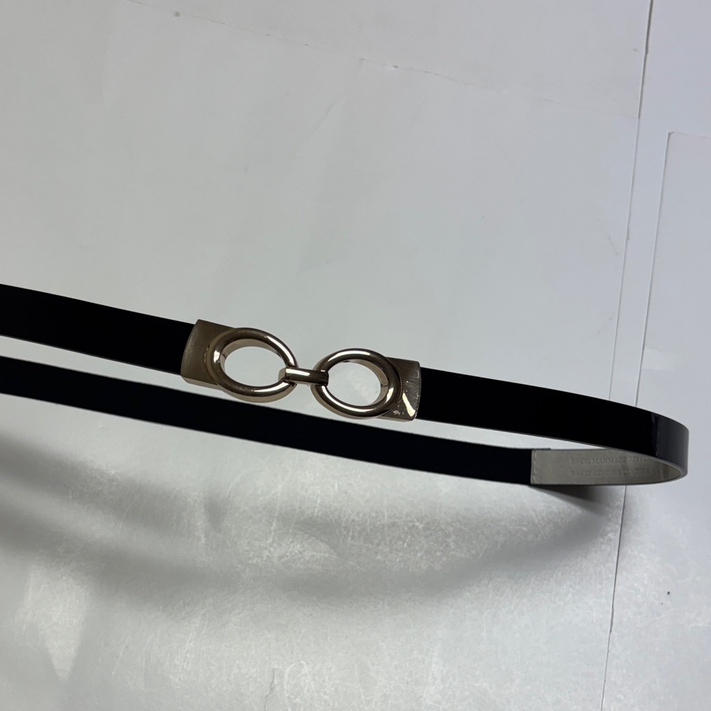 WHBM women’s black patent leather with gold buckle size XL
